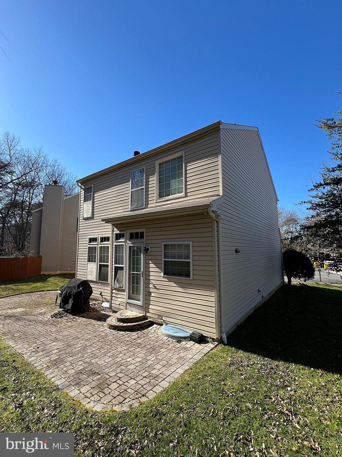 8334 Lyndhurst Street Laurel, MD 20724 - Photo 16 of 16 a view of a house with a yard