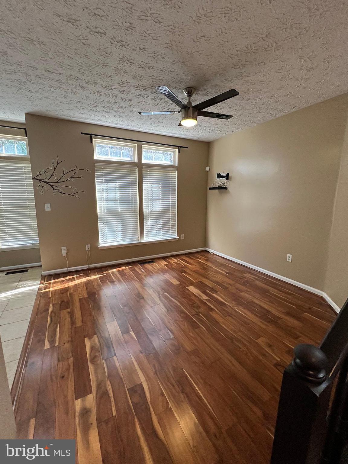 8334 Lyndhurst Street Laurel, MD 20724 - Photo 5 of 16 a view of an empty room with a window