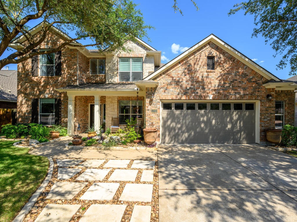 1710 Nelson Ranch Loop Cedar Park, TX 78613 - Photo 1 of 1 a front view of a house with a yard