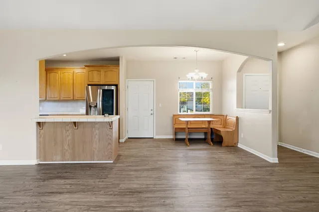 a view of kitchen with furniture and window