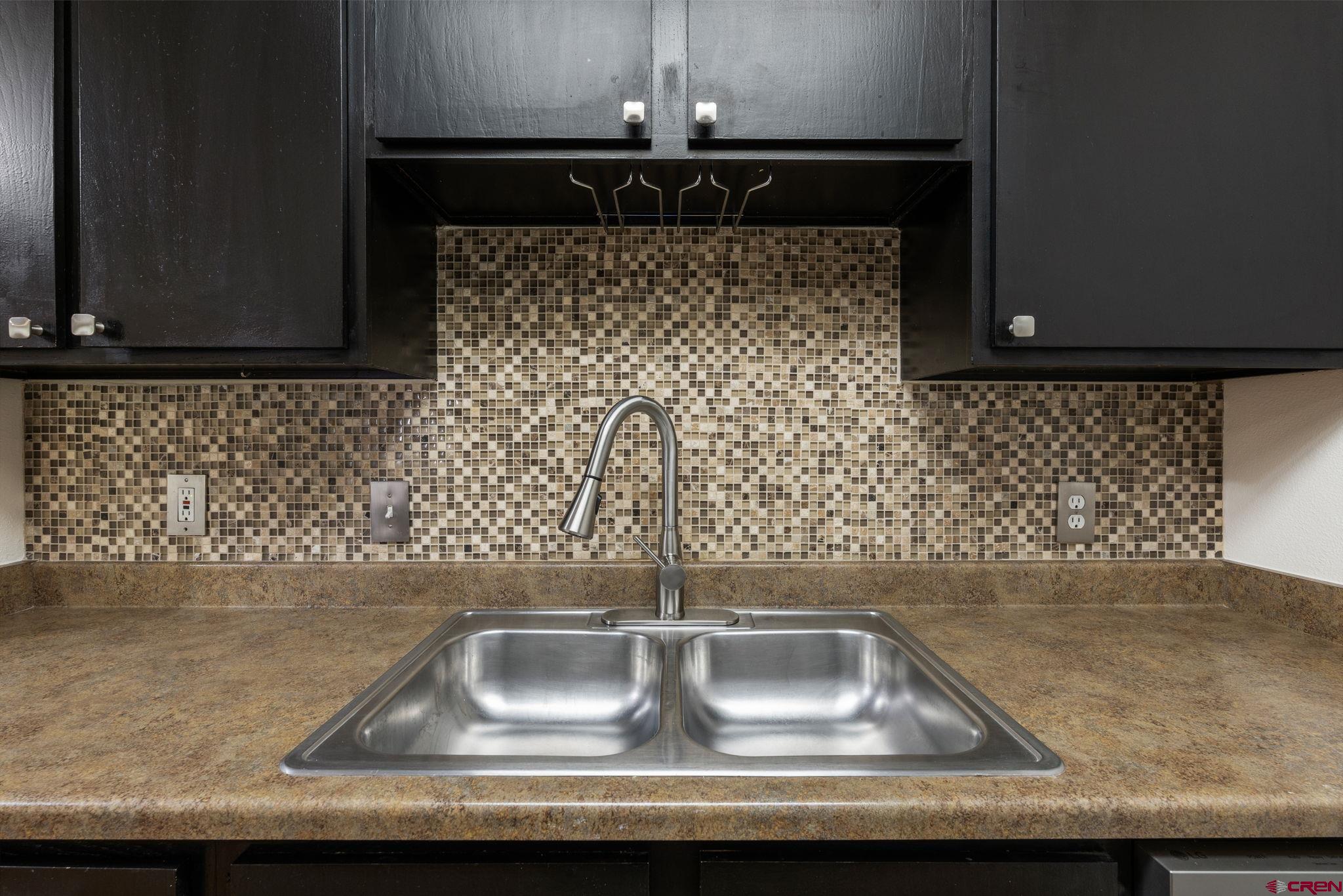 1100 Goeglein Gulch Road, Unit 171 Durango, CO 81301 - Photo 12 of 40 a bathroom with a sink and a mirror
