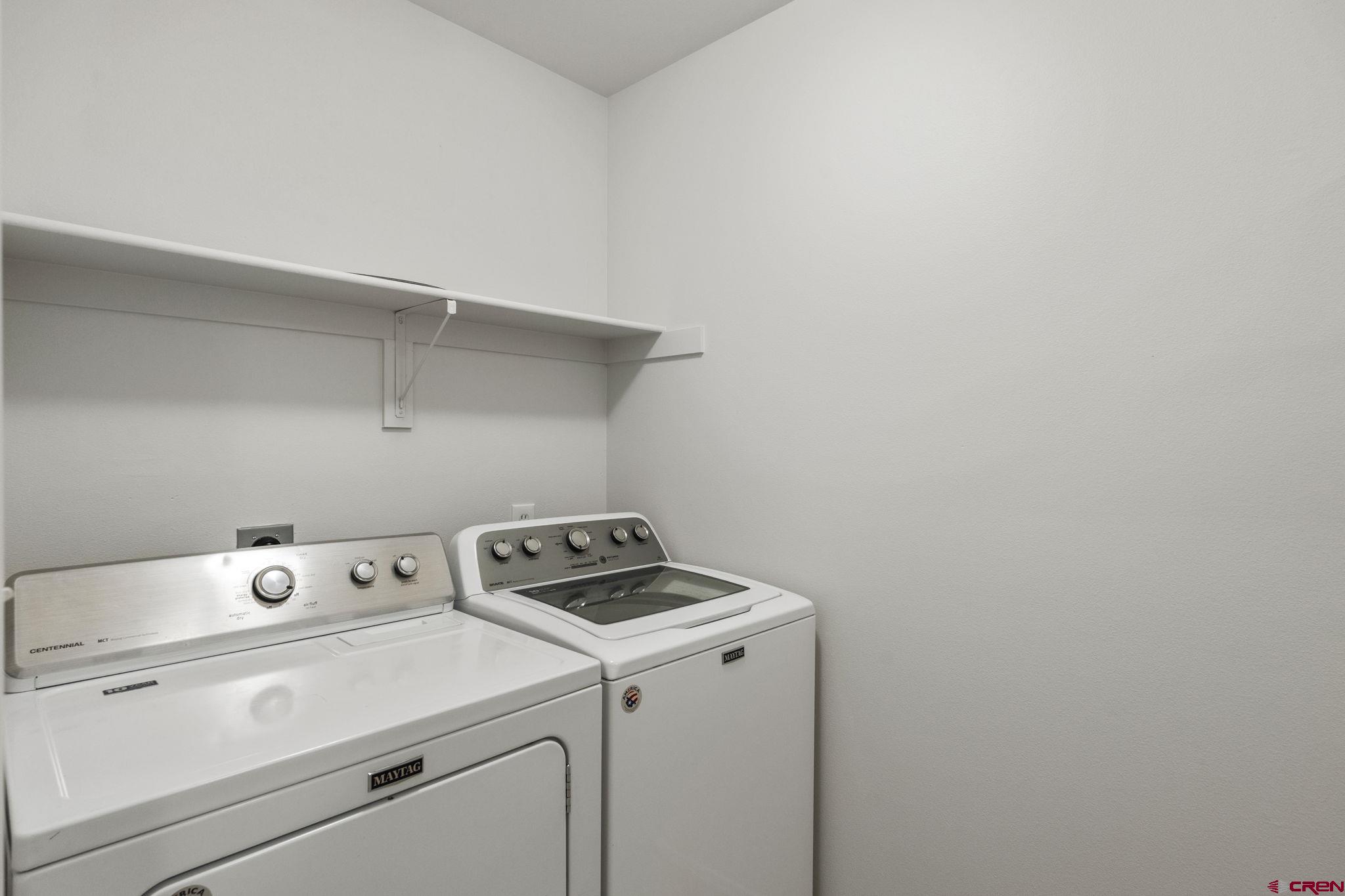 1100 Goeglein Gulch Road, Unit 171 Durango, CO 81301 - Photo 19 of 40 a view of storage and utility room with washer and dryer