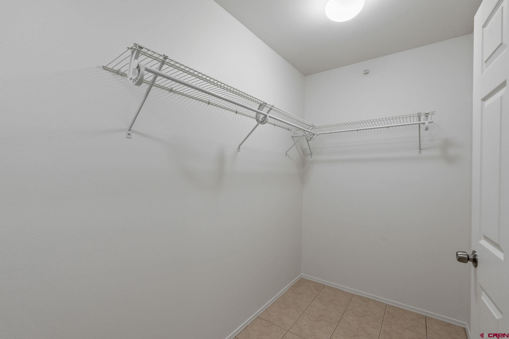 1100 Goeglein Gulch Road, Unit 171 Durango, CO 81301 - Photo 20 of 40 a view of a room with racks on the wall