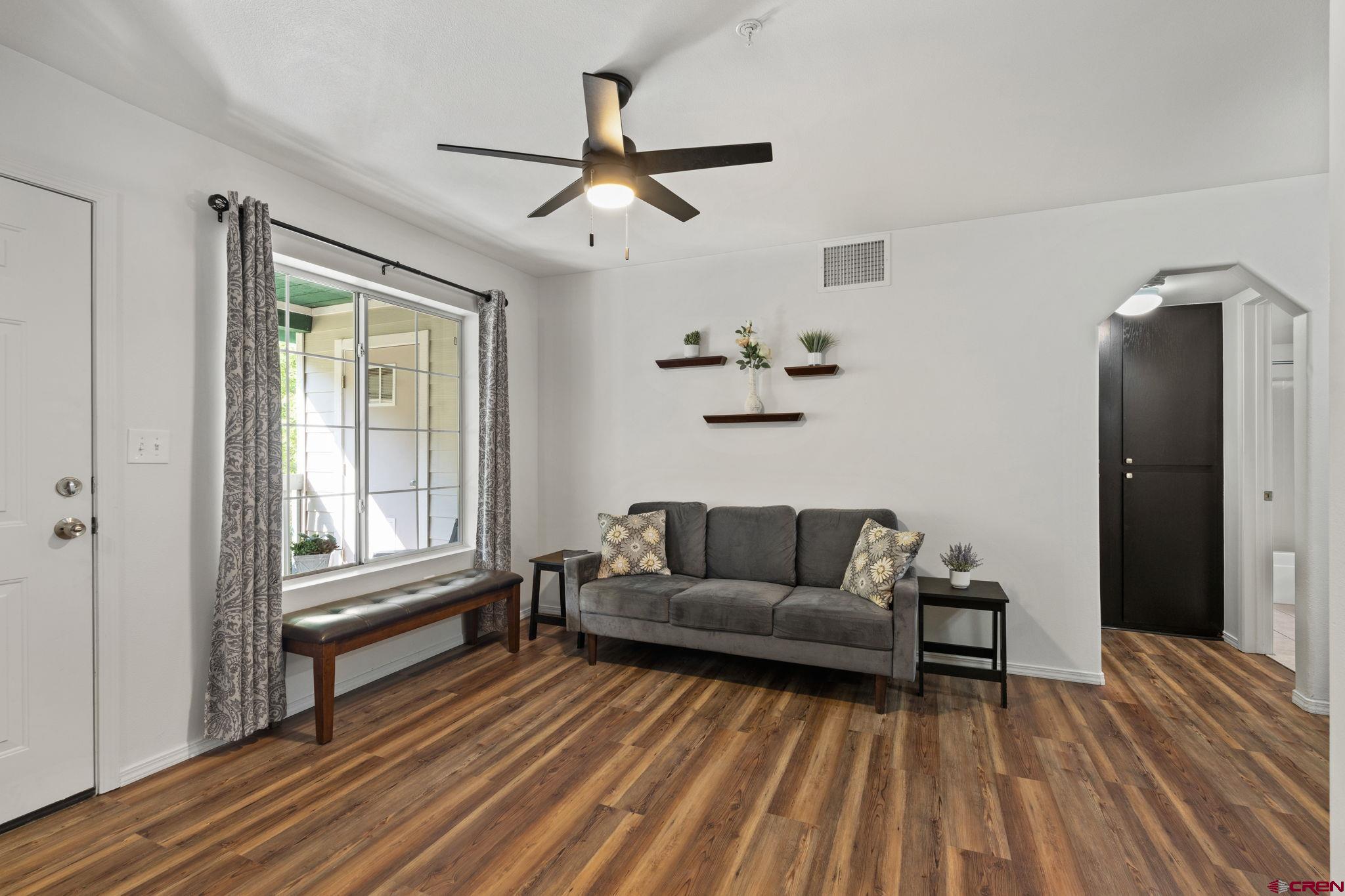 1100 Goeglein Gulch Road, Unit 171 Durango, CO 81301 - Photo 6 of 40 a living room with furniture and a window