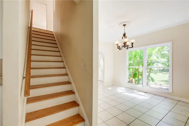 a view of a hallway with windows