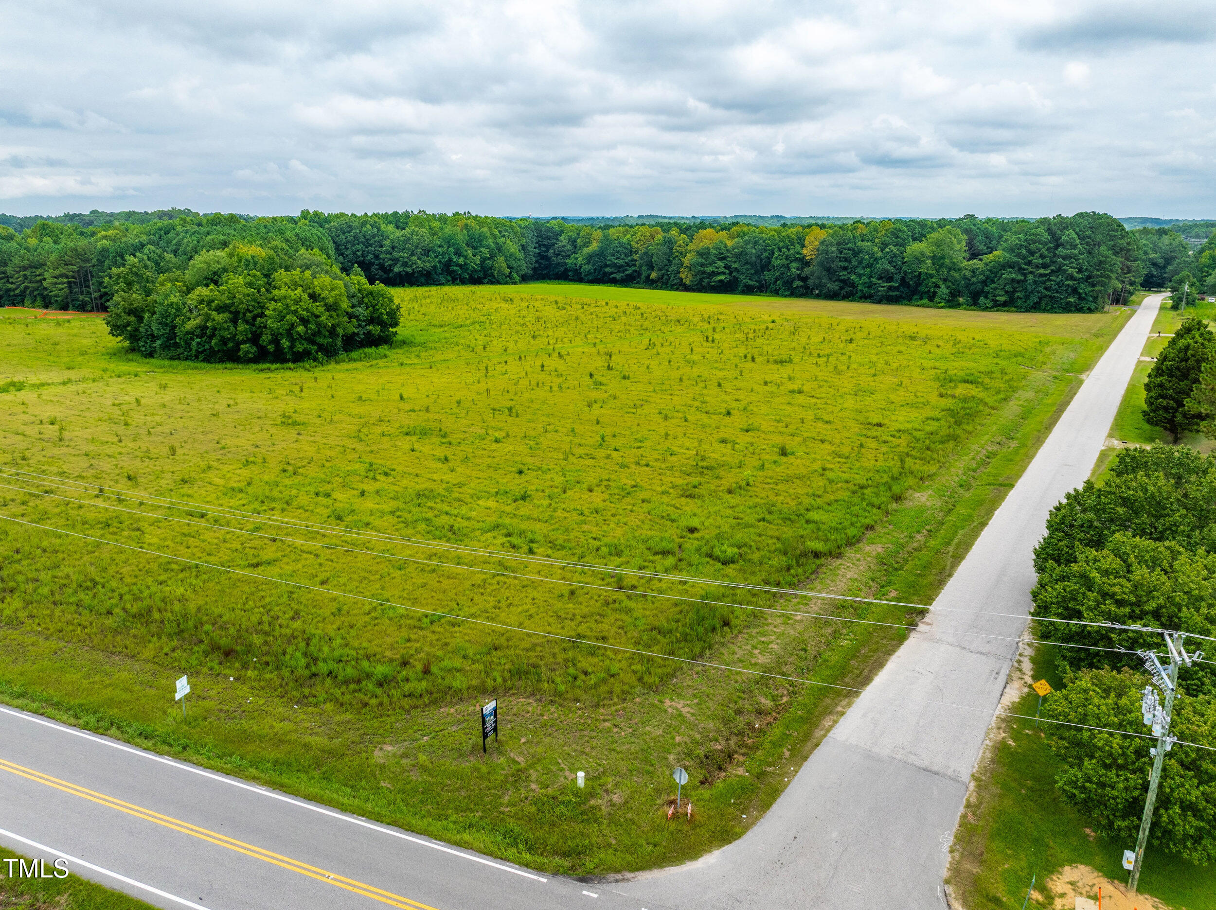 10317 Basmati Trail Zebulon, NC 27597 - Photo 16 of 17 a view of a lake from a balcony