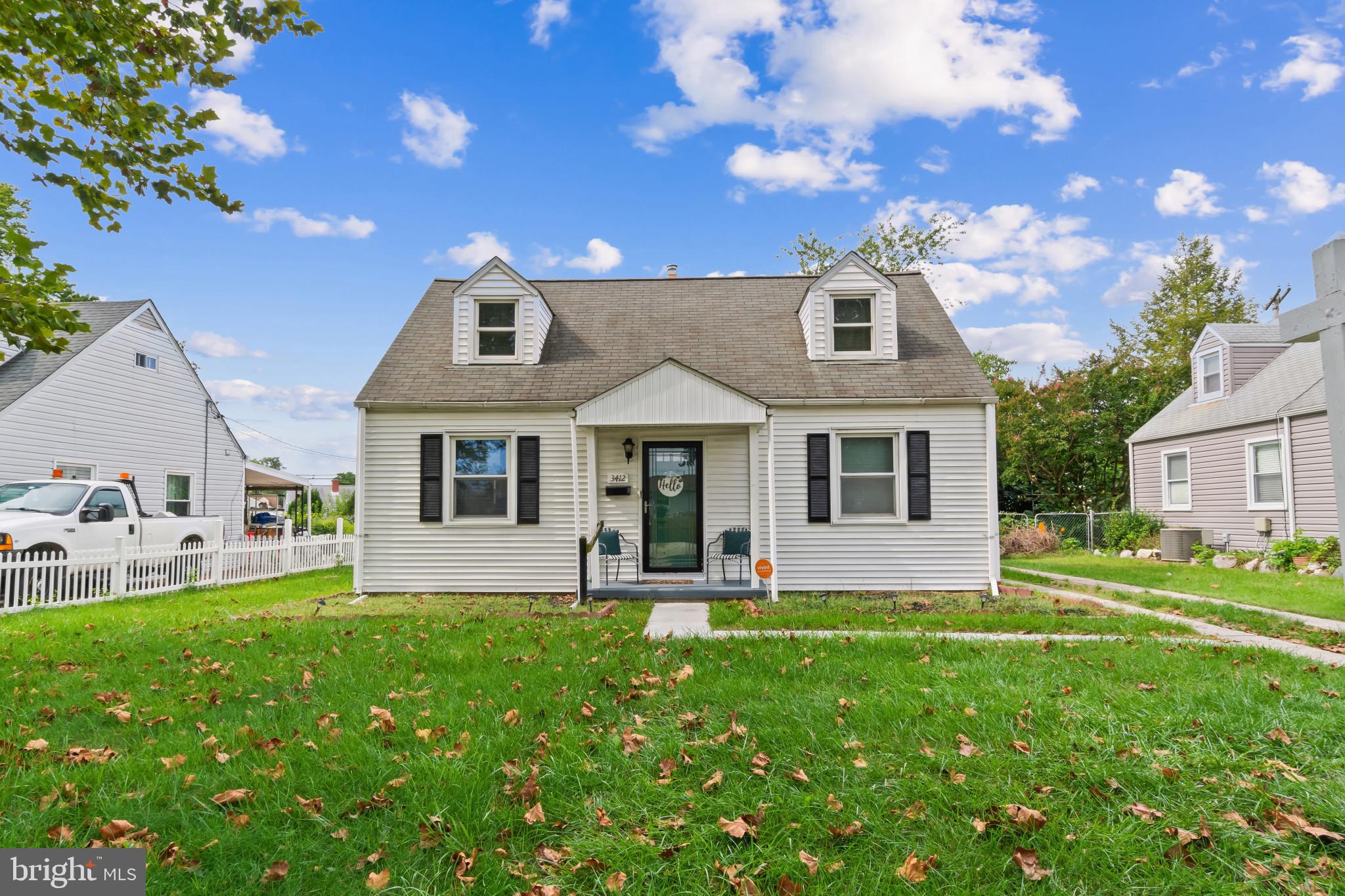 3412 Sollers Point Road Dundalk, MD 21222 - Photo 1 of 31 a front view of a house with a yard