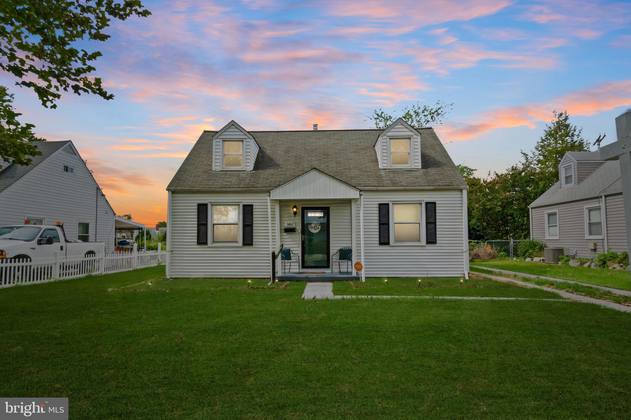 3412 Sollers Point Road Dundalk, MD 21222 - Photo 2 of 31 a front view of a house with a yard
