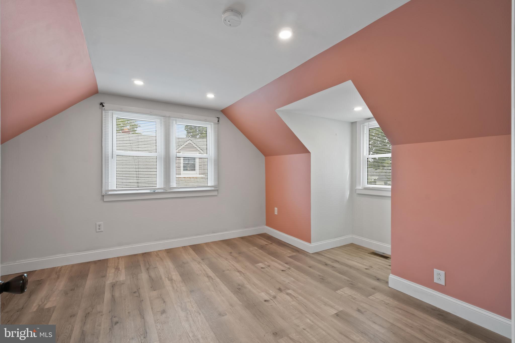 3412 Sollers Point Road Dundalk, MD 21222 - Photo 25 of 31 a view of an empty room with wooden floor and a window