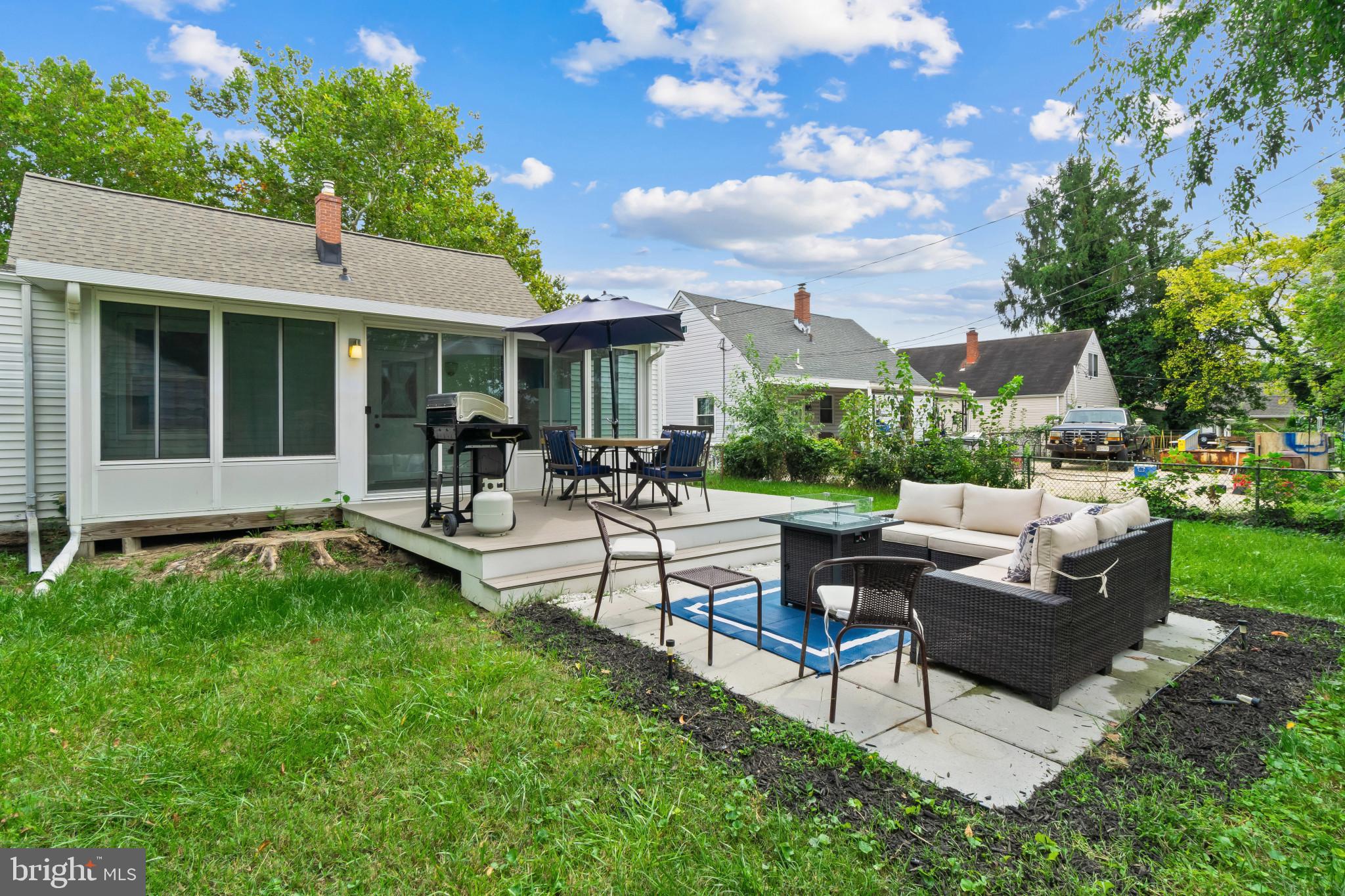 3412 Sollers Point Road Dundalk, MD 21222 - Photo 29 of 31 a view of a house with a couches in a patio