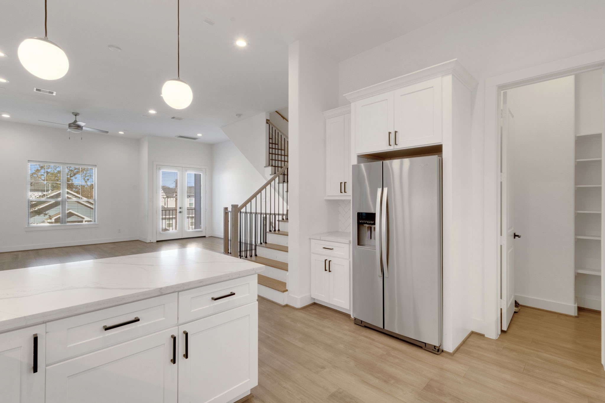 1526 Chestnut Street Houston, TX 77009 - Photo 19 of 45 a view of a kitchen with a sink and refrigerator