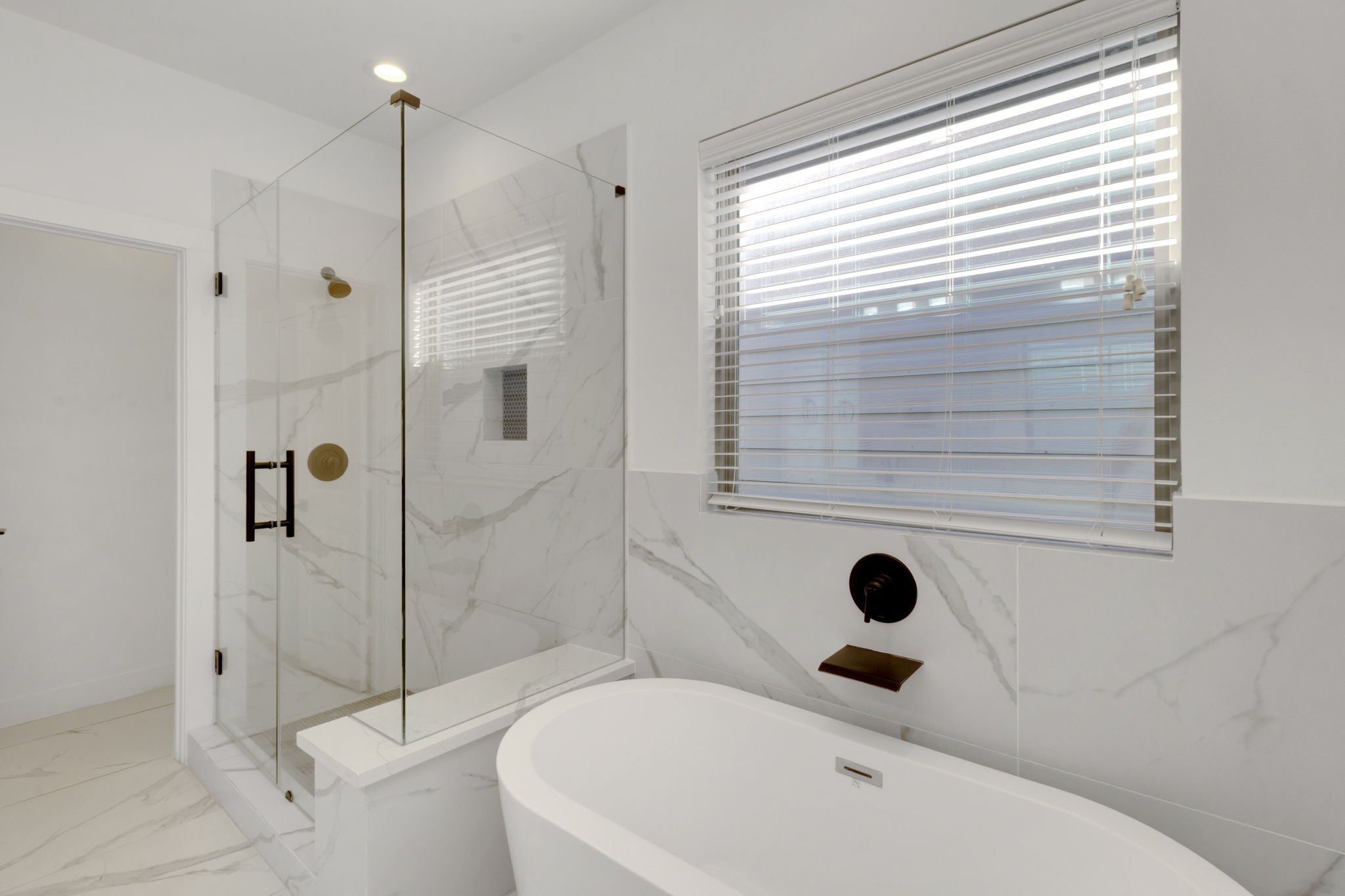 1526 Chestnut Street Houston, TX 77009 - Photo 35 of 45 a bathroom with a bathtub and a shower