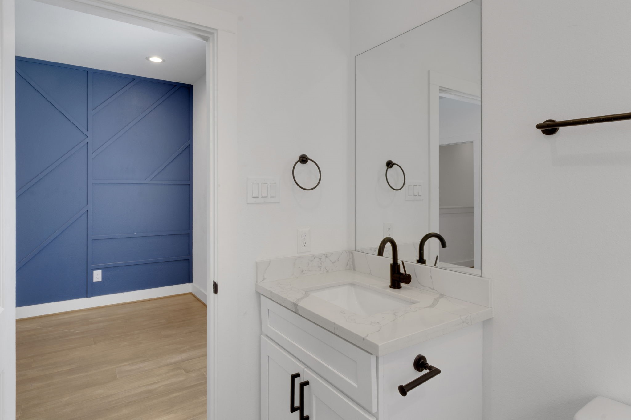 1526 Chestnut Street Houston, TX 77009 - Photo 42 of 45 a bathroom with a sink and a mirror
