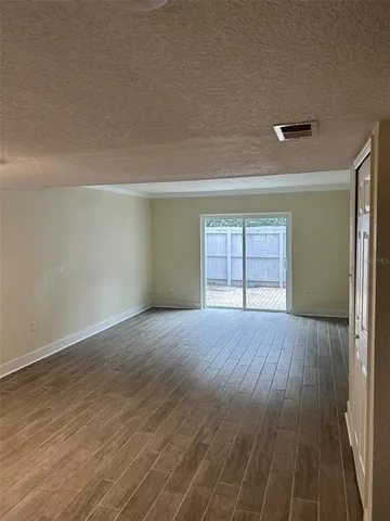 a bathroom with a shower and a toilet