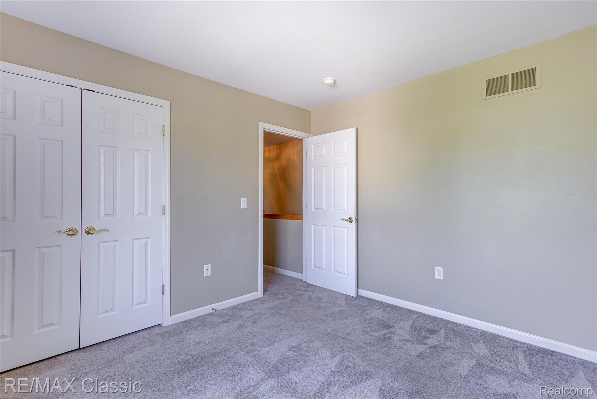 41620 Mitchell Road Novi, MI 48377 - Photo 28 of 40 Bed 2 with double closet.