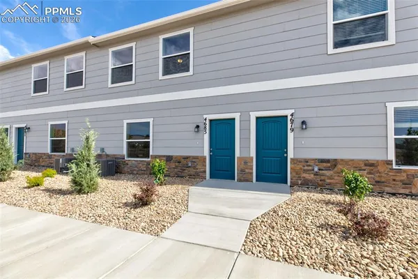 a front view of a house with a patio