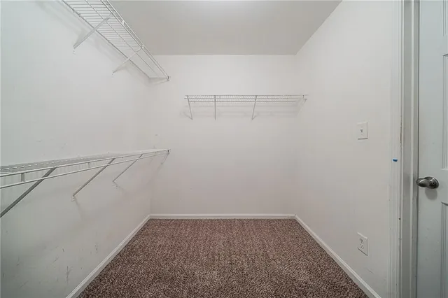 a view of a room with racks on the wall