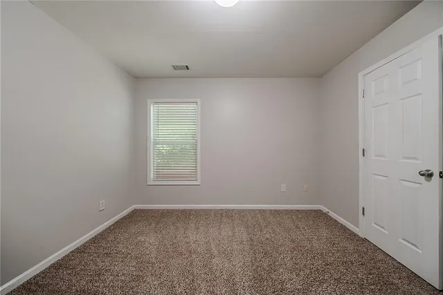a view of a room that has a window in it