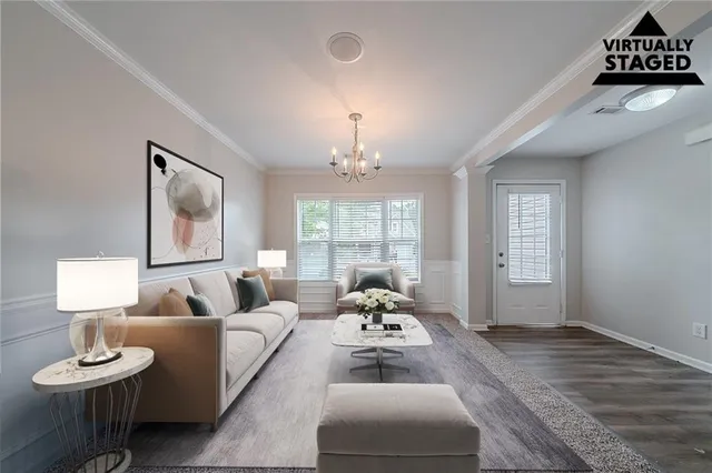 a spacious bedroom with a bed and a window