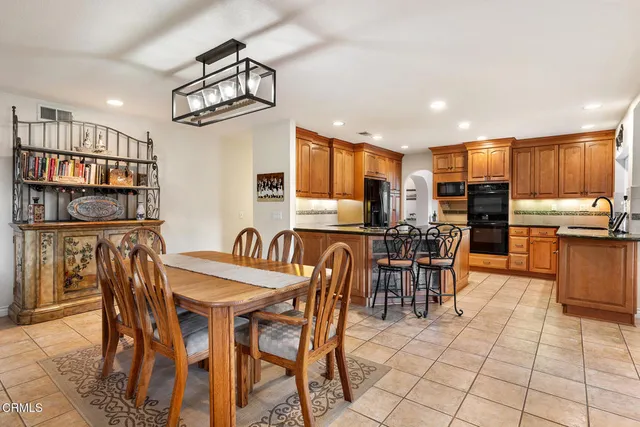 a view of a dining room with furniture