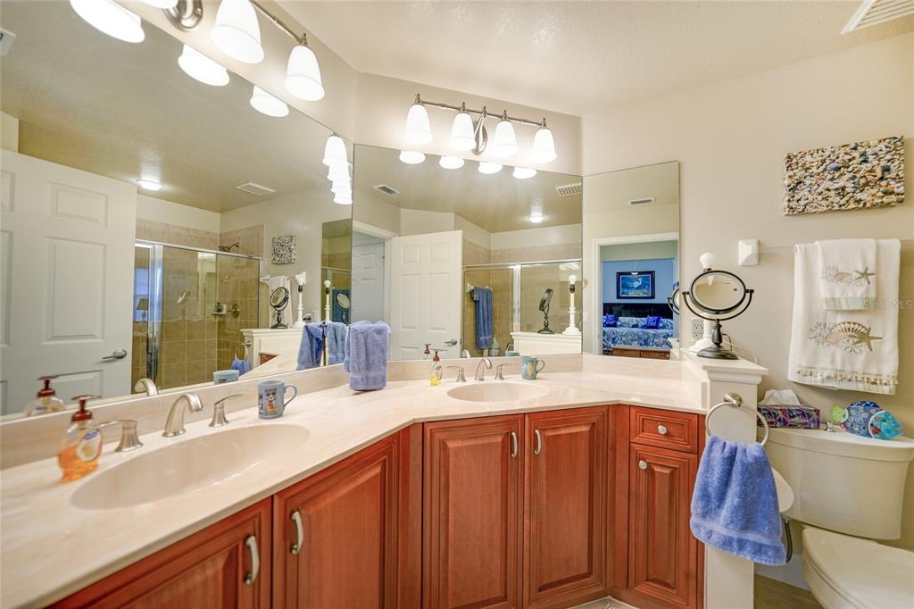 17094 Acapulco Road, Unit 313 Punta Gorda, FL 33955 - Photo 20 of 49 a bathroom with a sink double vanity and a mirror