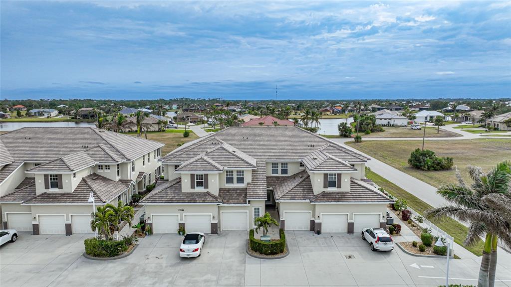 17094 Acapulco Road, Unit 313 Punta Gorda, FL 33955 - Photo 40 of 49 an aerial view of a house with a garden space