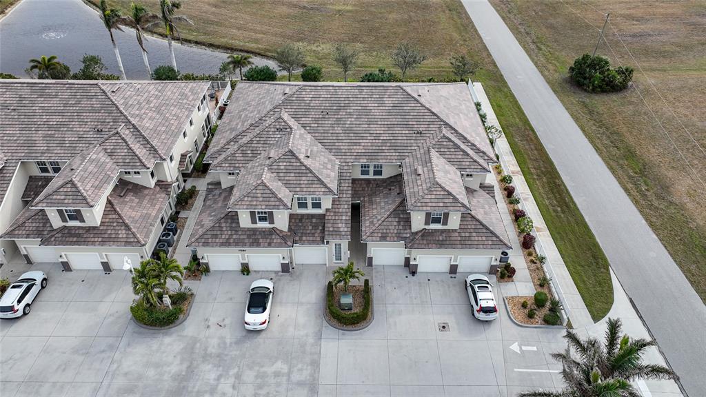 17094 Acapulco Road, Unit 313 Punta Gorda, FL 33955 - Photo 41 of 49 an aerial view of house with parking