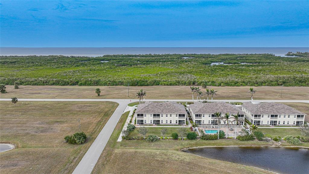 17094 Acapulco Road, Unit 313 Punta Gorda, FL 33955 - Photo 43 of 49 a view of an outdoor space and yard