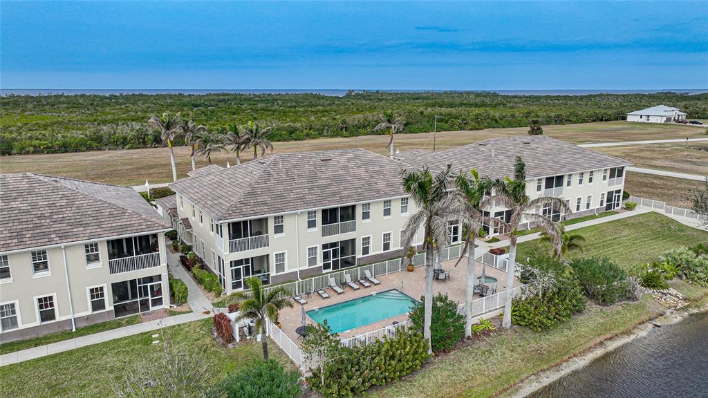 17094 Acapulco Road, Unit 313 Punta Gorda, FL 33955 - Photo 47 of 49 an aerial view of multiple house