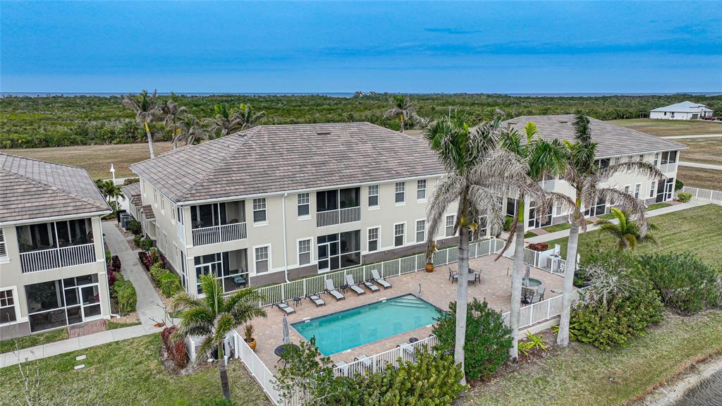 17094 Acapulco Road, Unit 313 Punta Gorda, FL 33955 - Photo 48 of 49 an aerial view of a house with a garden