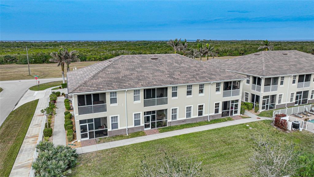 17094 Acapulco Road, Unit 313 Punta Gorda, FL 33955 - Photo 49 of 49 a aerial view of a house with a yard