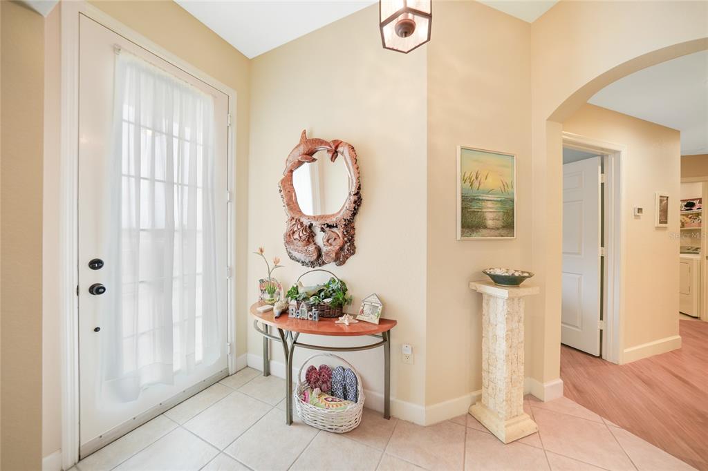 17094 Acapulco Road, Unit 313 Punta Gorda, FL 33955 - Photo 6 of 49 a view of an entryway with wooden floor