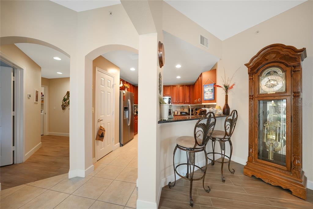 17094 Acapulco Road, Unit 313 Punta Gorda, FL 33955 - Photo 7 of 49 a view of a hallway with furniture and a livingroom view