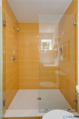 a view of backyard with swimming pool and porch