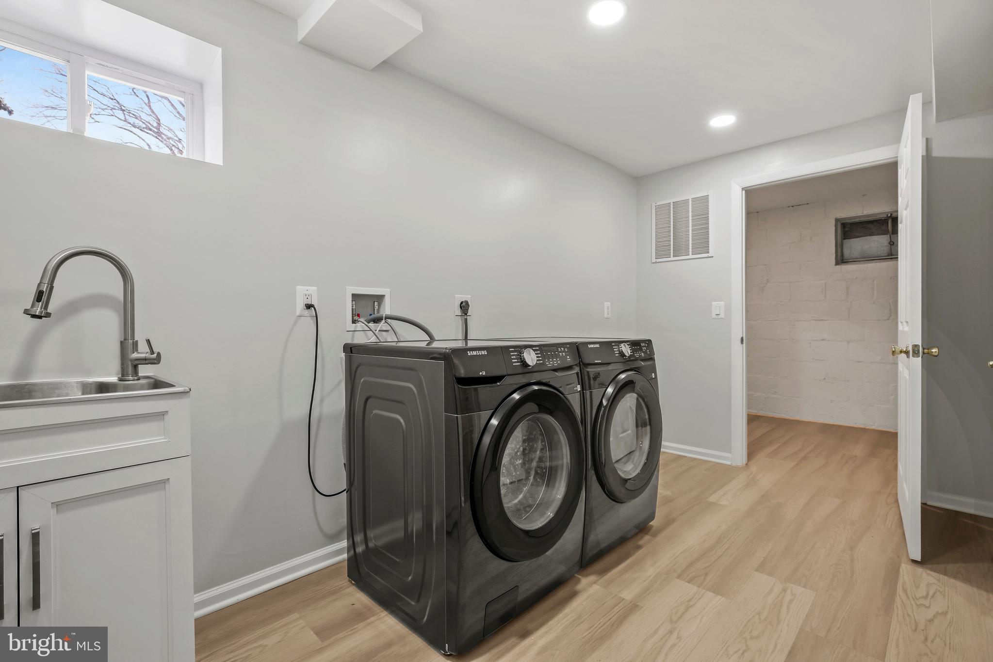 1445 Northgate Road Northwest Washington, DC 20012 - Photo 36 of 39 Laundry room with laundry sink and extra storage