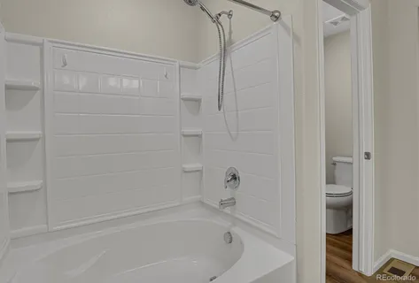 a bathroom with a bathtub