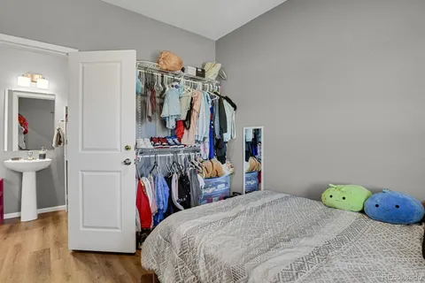a bedroom with bed and utility