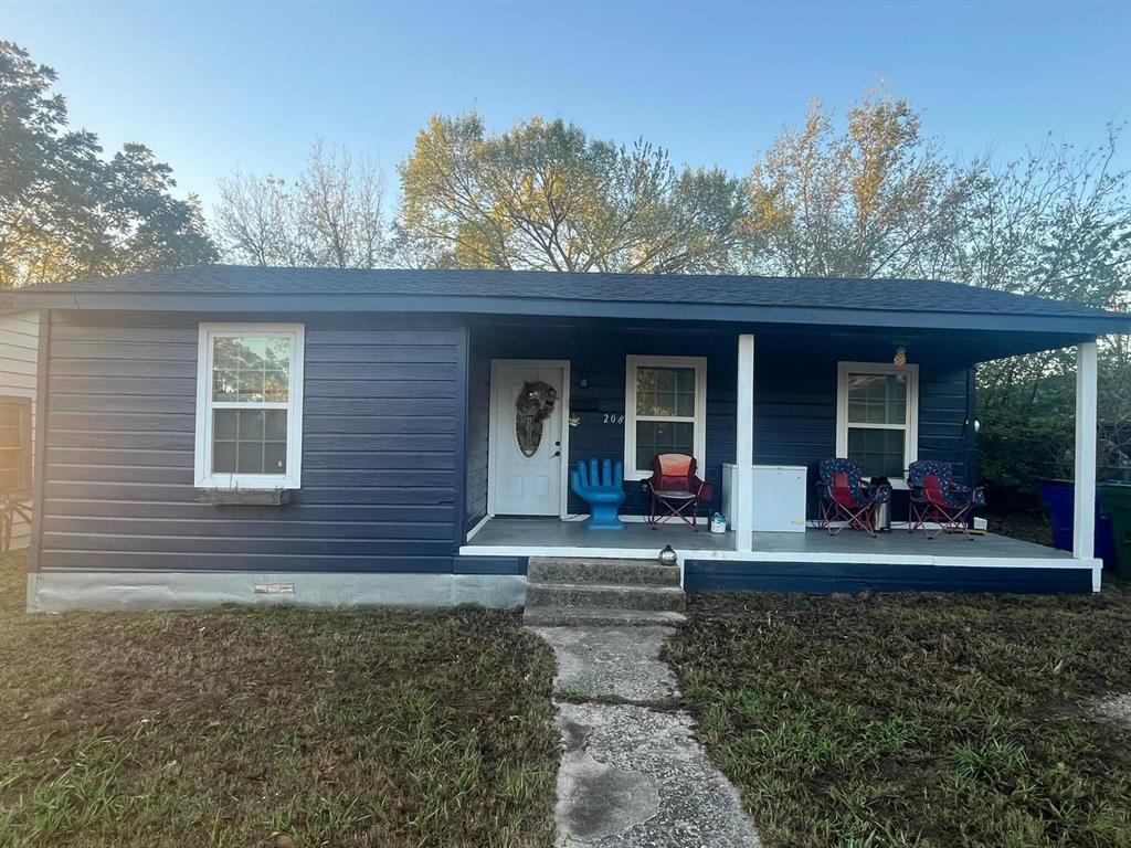View of front of house with covered porch