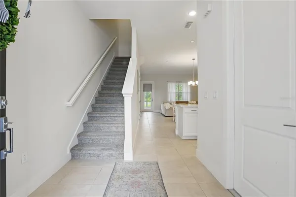 a view of entryway and hall with a window