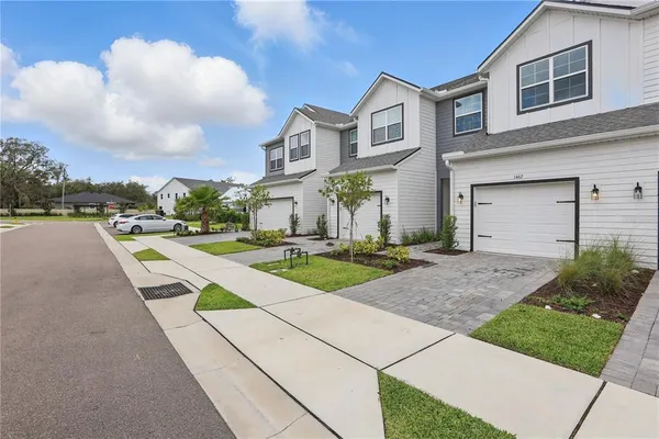 a house view with a garden space