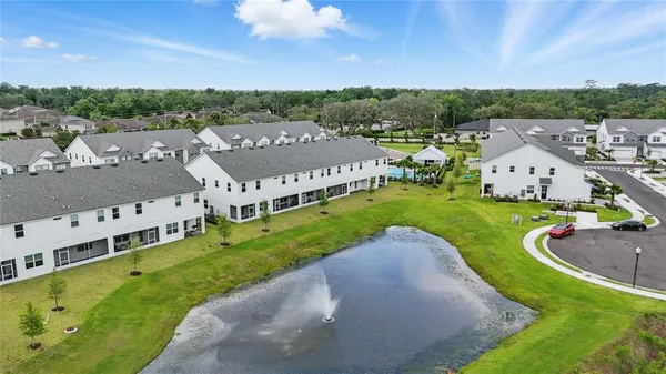 an aerial view of a house with a garden