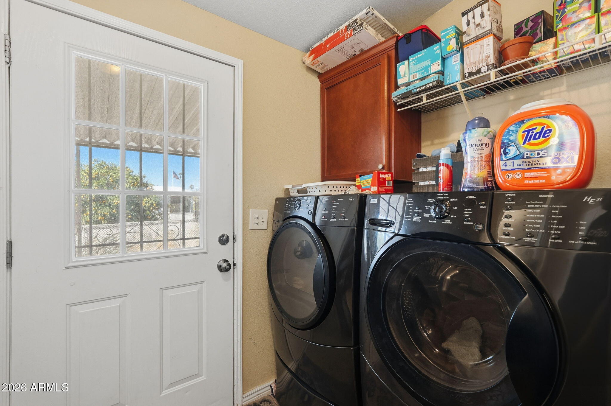 1355 West 4th Avenue Apache Junction, AZ 85120 - Photo 18 of 26 a utility room with dryer and washer