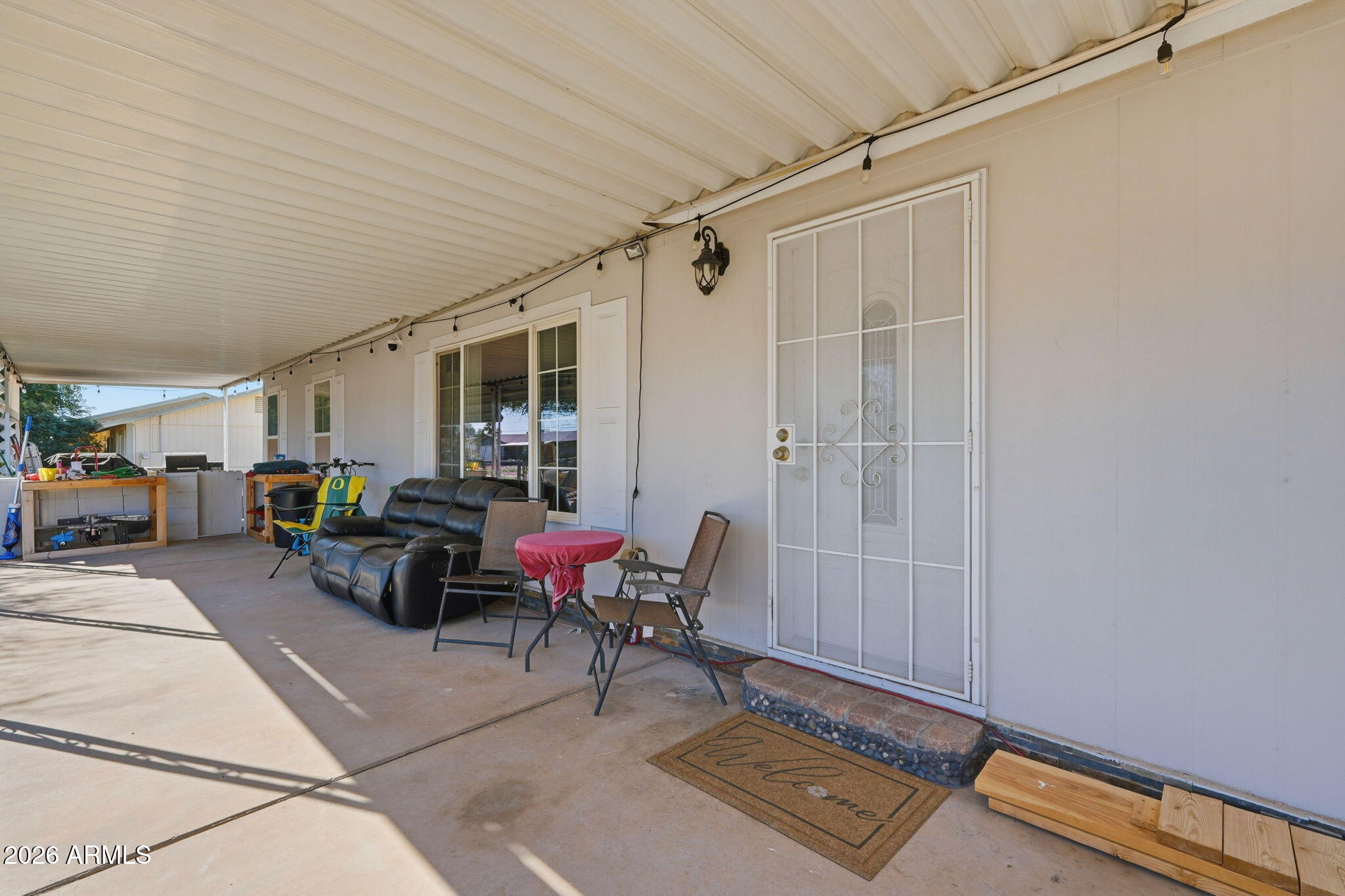 1355 West 4th Avenue Apache Junction, AZ 85120 - Photo 19 of 26 a living room with furniture and a window