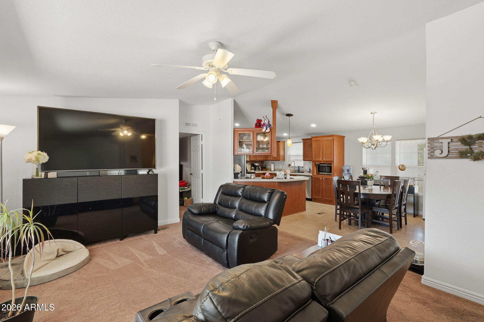 1355 West 4th Avenue Apache Junction, AZ 85120 - Photo 5 of 26 a living room with furniture and a flat screen tv