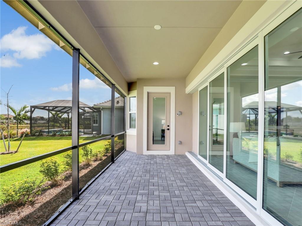 8850 Calypso Court Naples, FL 34113 - Photo 35 of 49 a view of a balcony