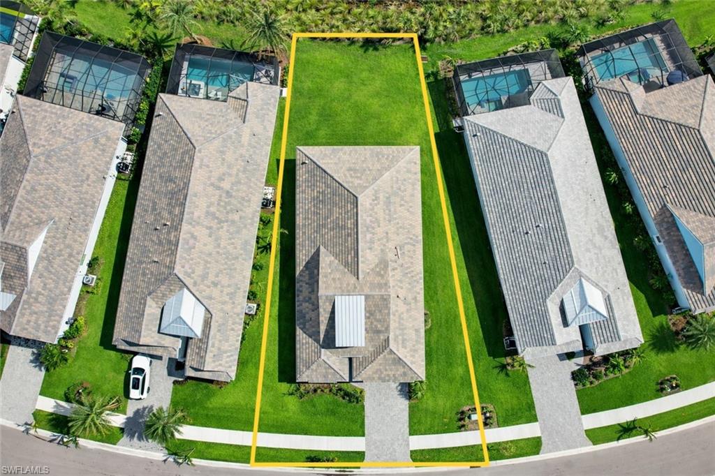 8850 Calypso Court Naples, FL 34113 - Photo 46 of 49 an aerial view of a house