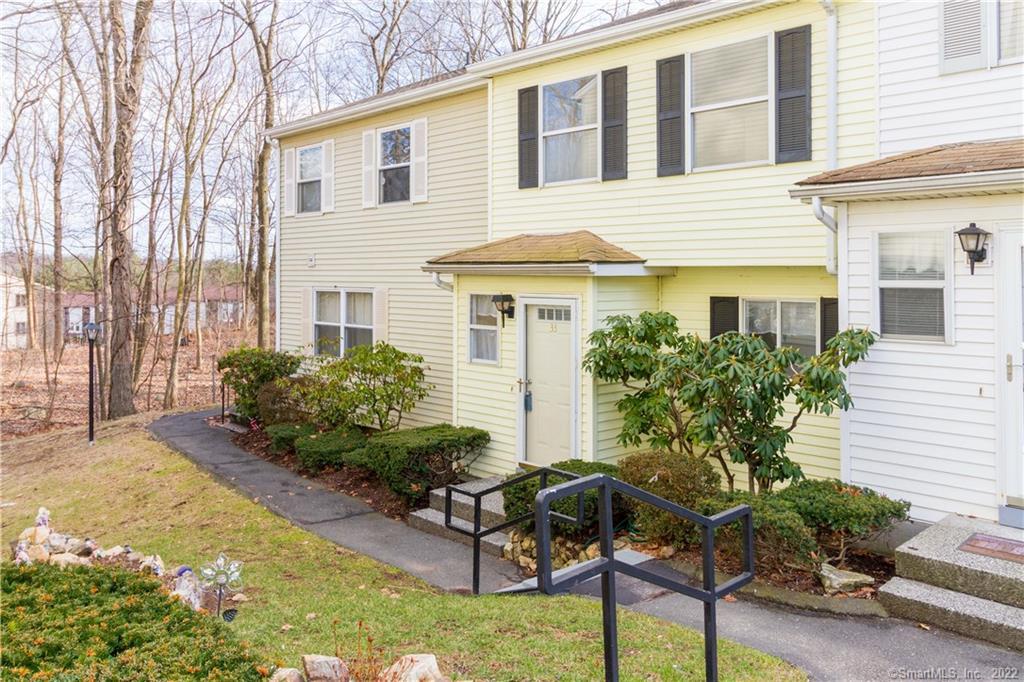 25 Padanaram Road, Unit 33 Danbury, CT 06811 - Photo 1 of 1 a house view with a seating space