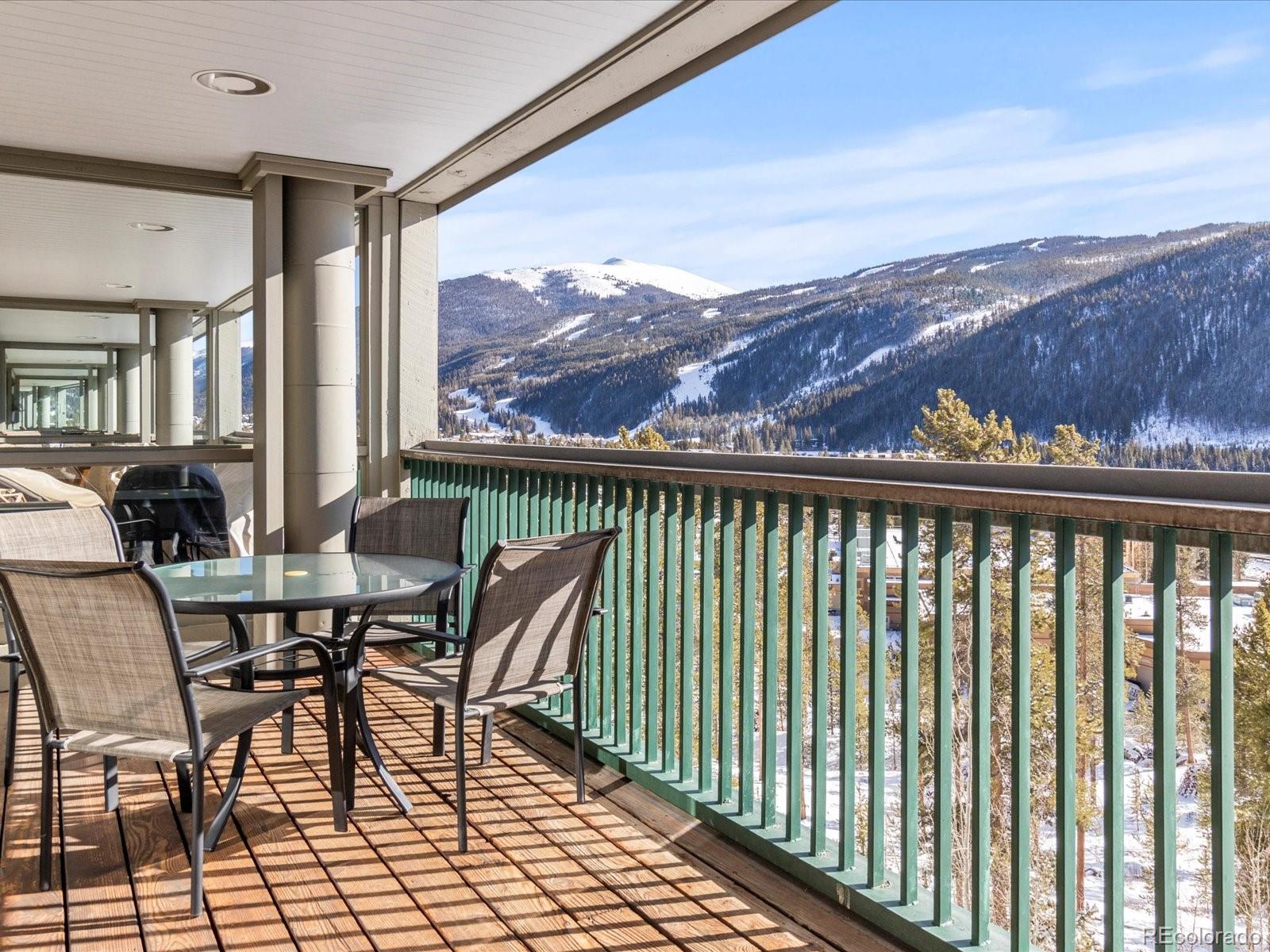 22097 Saints John Road, Unit 2540 Dillon, CO 80435 - Photo 19 of 28 a view of a chairs and table in the balcony