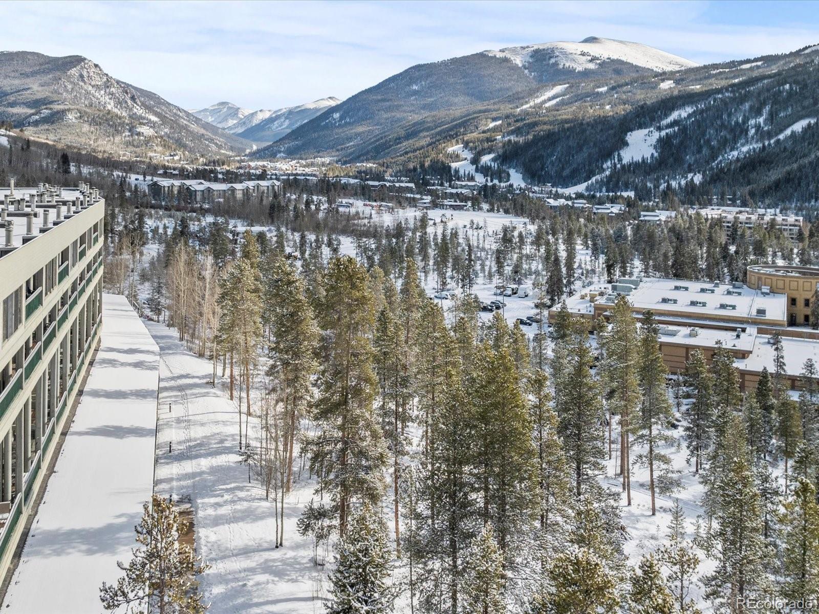 22097 Saints John Road, Unit 2540 Dillon, CO 80435 - Photo 26 of 28 a view of a lake with a mountain