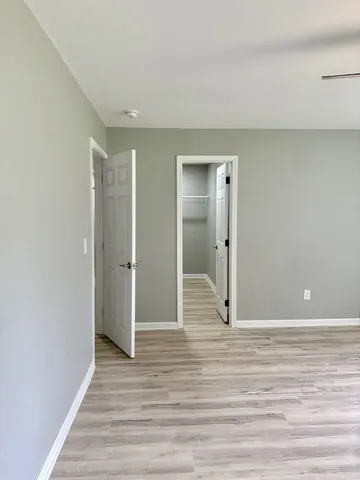 a view of a livingroom with wooden floor